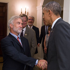 President Barack Obama greets bill signing attendees before signing H.R. 1138 Sawtooth National Recreation Area and Jerry Peak Wilderness Additions Act, in the Oval Office, Aug. 7, 2015. (Official White House Photo by Pete Souza) This photograph is provided by THE WHITE HOUSE as a courtesy and may be printed by the subject(s) in the photograph for personal use only. The photograph may not be manipulated in any way and may not otherwise be reproduced, disseminated or broadcast, without the written permission of the White House Photo Office. This photograph may not be used in any commercial or political materials, advertisements, emails, products, promotions that in any way suggests approval or endorsement of the President, the First Family, or the White House.